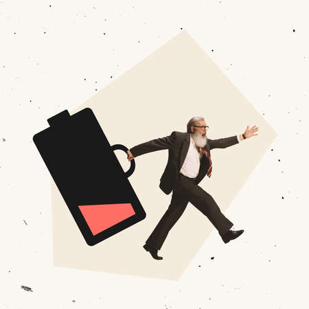 Creative collage. Senior businessman running for work with low battery symbol symbolizing fatigue, tirednessの写真素材