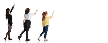 Collage with young girl, trainee working on new business project isolated over white backgroundの写真素材