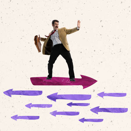 Creative design. Ambitious, motivated employee, businessman on arrow moving against othersの写真素材