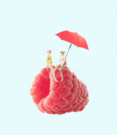 Contemporary art collage. Two girls in swimming suit sitting on raspberry under beach umbrella...