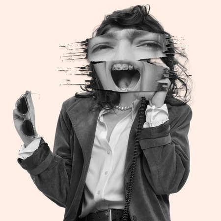 Contemporary art collage. Bossy young woman with face part elements talking on phone isolated on pink backgound. Concept of surrealism, creativity, imagination, emotions, lifestyle, adの写真素材