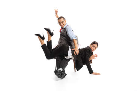 Portrait of man, office manager and woman, employee isolated over white studio background. Working...
