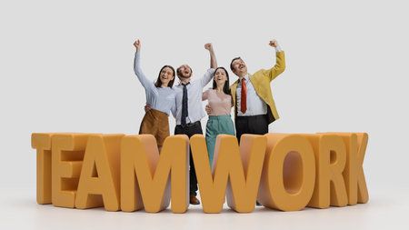 Group of cheerful people, employees showing happiness and celebrating successful cooperation....