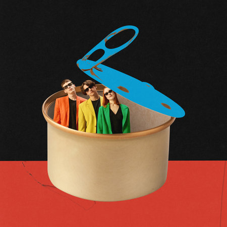 Office marionettes. Young employees in bright colorful jackets standing inside can. Professional routine and manipulation. Contemporary art collage. Concept of surrealism, inspiration. Creative designの写真素材