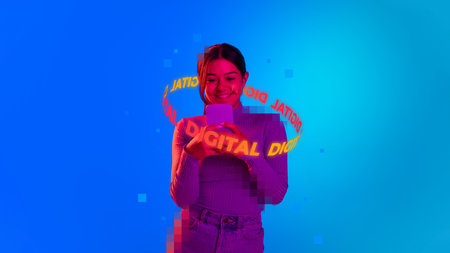 Contemporary technology. Young smiling girl chatting on smartphone with neon lettering Digital around head isolated over blue background. Concept of digitalization, AI, technology eraの写真素材