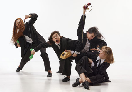 Work racing. Portrait with group of young charming business women, office workers quarreling on workplace over white studio background. Concept of deadlines, overworking, pressure, competition, adの写真素材
