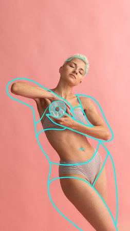 Sensual short haired woman in lingerie with drawn blue body silhouette with donut. Model posing over studio background. body positivity. Concept of healthy eating, diet, body care, sport. adの写真素材