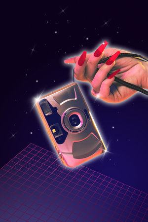Poster. Contemporary art collage. Female hand with long nails holds vintage camera against cosmic...
