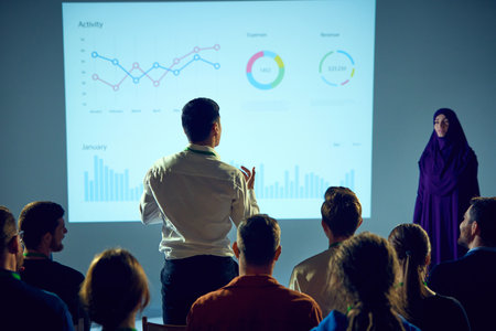 Business expert delivering presentation to audience, with focus on neural network graphic, while...