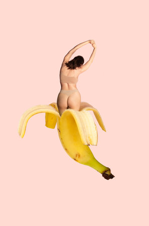 Contemporary art collage. Human vitality with fruitfulness of nature. Woman in beige underwear stretches atop banana. Concept of femininity, female health, beauty, human rights, unityの写真素材