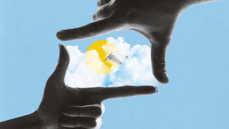 Contemporary art collage. Memories. Reality can be framed and interpreted in various ways. Hands framing flying bird in the sky with clouds and sun, creating illusion. Concept of nature, beauty.の写真素材