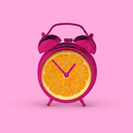 Contemporary art collage. Time of sunshine. Pink alarm clock shaped like slice of orange against vibrant background. Concept of hot summer holidays, party, pop art. Minimal design.の写真素材