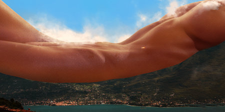 Contemporary art collage. Beautiful woman lying across coastal town, transforming into mountain range under blue sky. Concept of recreation, summer holiday, relax, tourism, people and nature.の写真素材