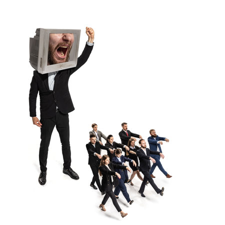Surreal artwork. Large figure with TV screen for head, showing shouting face, leads group of professionals walking robotically. Concept of propaganda, news, control, dictation, media manipulation.の写真素材
