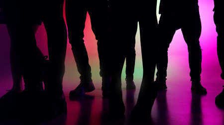 Bright lights and rhythmic music unite crowd, creating a night filled with dancing, laughter, and youthful energy. Copy space. Concept of party, youth, carefree, celebration. adの写真素材