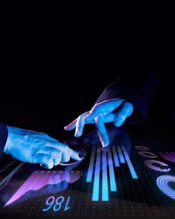 Two professionals engaging with futuristic digital interface, interacting with glowing blue data...