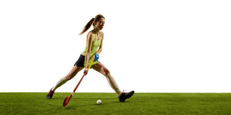 Female hockey player moves forward with drive and confidence demonstrating fluid coordination and...