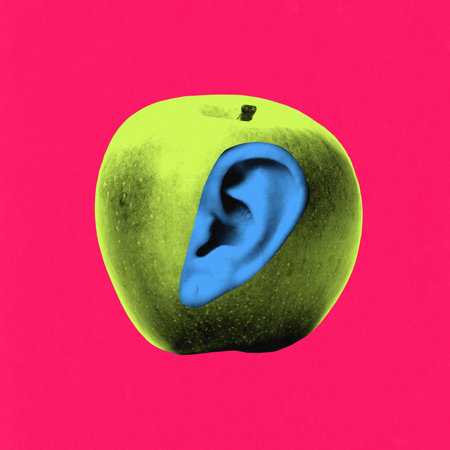 Contemporary art collage. Green apple with blue ear in side against magenta backdrop, challenging sensory logic and food familiarity. Concept of fast-food, senses, organic, absurd taste.の写真素材