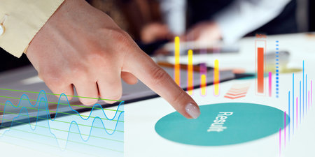 Conceptual collage. Finger presses virtual Result button next to colorful income graphs and...