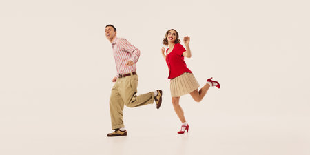 Retro lindy hop dancers joyfully practice energetic swing moves. Concept of vintage dance, cultural...