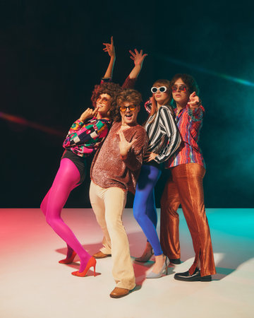 Retro fashion team striking bold pose in disco-inspired look. Concept of vintage fashion...