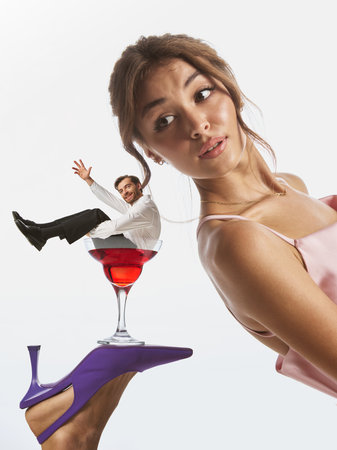 Colorful poster. Elegant woman balancing on her heel glass with tiny man sitting inside. Concept of...