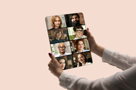 Graphic composition. Woman holding tablet during online meeting with international colleagues. Concept of remote communication, global collaboration, online education, and digital workplace harmony.の写真素材