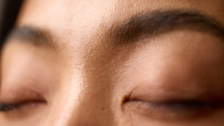 Macro of closed eyes showing calm relaxation and natural skin softness. Concept of wellness...