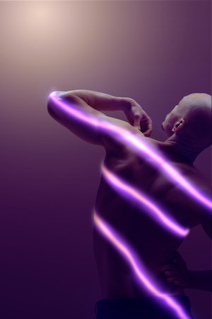 Modern artwork of male back shaped by flowing purple glowing lines. Concept of muscle relief, therapeutic mapping, athletic mobility diagnostics and modern wellness visualization.の写真素材