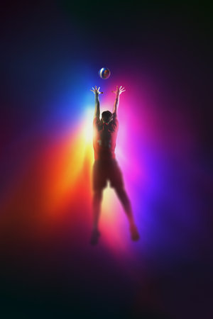 Colorful sports mixed media shows volleyball player setting the ball under gradient lighting. Concept of teamwork practice, play coordination.の写真素材