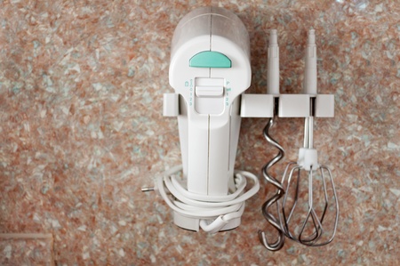 Mixer hangs on the wall in the kitchenの写真素材