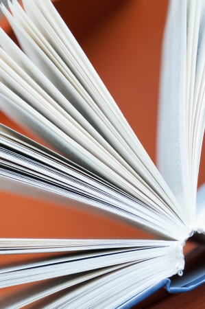 Closeup of opened book on tableの写真素材