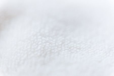 Beige delicate soft  background of plush fabric.の写真素材