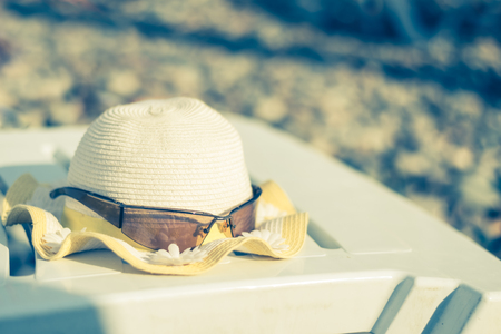 Sunglasses on a sunbed on a sunny day on the beach on the Black Sea coast. Concept: rest on the beach. Beach holidaysの写真素材