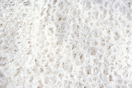 Knitting.Striped  white knit fabric texture, knitted pattern background. Copy space. Flat lay, top view.の写真素材