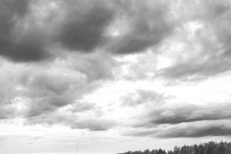 Beautiful Blue Sky with Dramatic Clouds. A Nature Spectacles backgrounds. Black and white image.