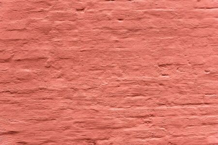 Red pinted Wall Background. Old Grungy Brick Wall Horizontal Texture. Brickwall Retro Brown Grunge Backdrop. Stonewall red Wallpaper.の写真素材
