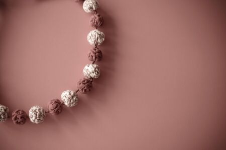 decoration, handmade beads made of fabric redの写真素材