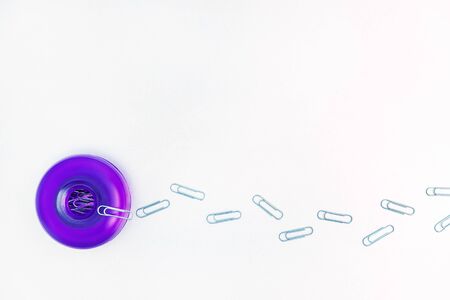 A trail of paper clips moving into your box. Stationery organizer, office order, border or frame for...
