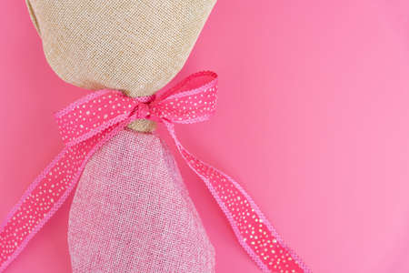 Pink net curtains with ribbon bow, girlish designの写真素材