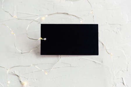 Empty black label or banner with garland laceの写真素材