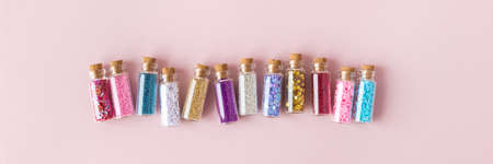 Glitter or confetti in tubes, banner for xmasの写真素材
