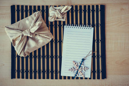 Christmas furoshiki wrapping. ethical christmas gift.の写真素材