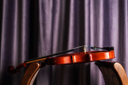 Wooden musical instrument laying on chairsの写真素材