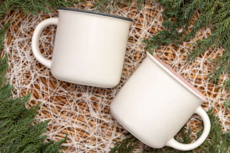 Blank empty mug on white christmas background