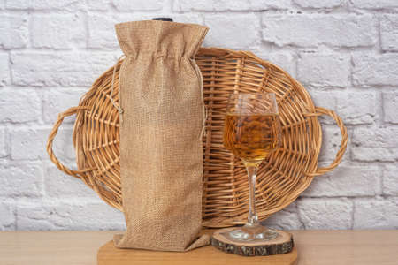 Christmas mockup wine gift bag and wine glass. New Years Eve Mockupの写真素材