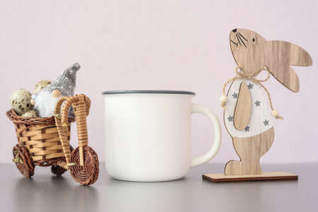 White coffee mug easter mockup with bunnyの写真素材