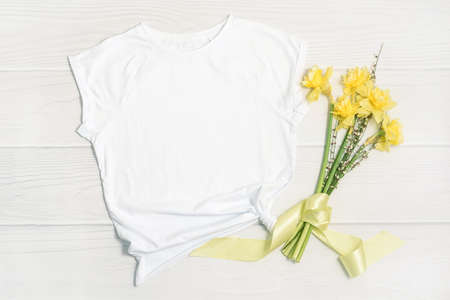 Mockup white t-shirt and yellow bouquet.の写真素材