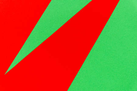 Abstract with red on green sheets background. Natural bright color paper texture backdrop. Christmas empty space texture.の写真素材
