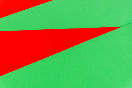 Abstract with red on green sheets background. Natural bright color paper texture backdrop. Christmas empty space texture.の写真素材